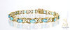 Blue Topaz Bracelet 10K Yellow